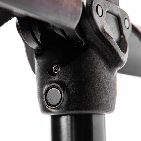 Close up of upper yoke of SWIFT OG portable gearstand, showing stainless-steel fixture on white background.